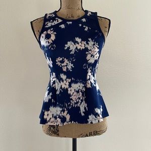 sleeveless peplum top
